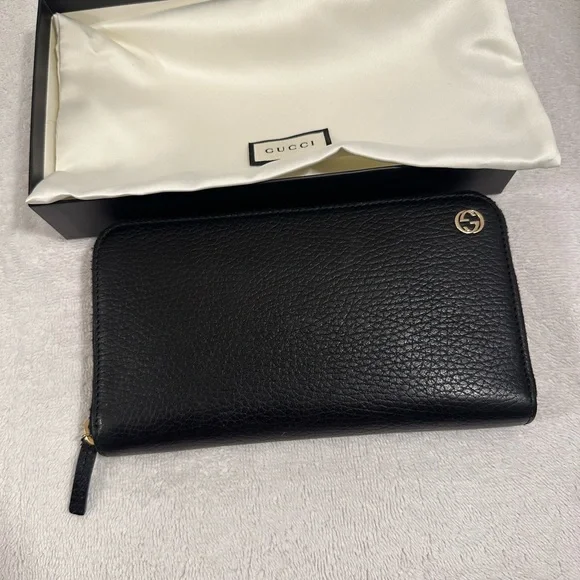 Gucci zippy wallet with signature GG on front - Picture 6 of 7